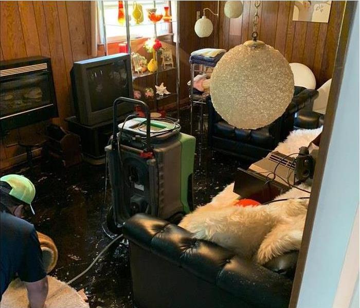 belongings in a home impacted by storm damage